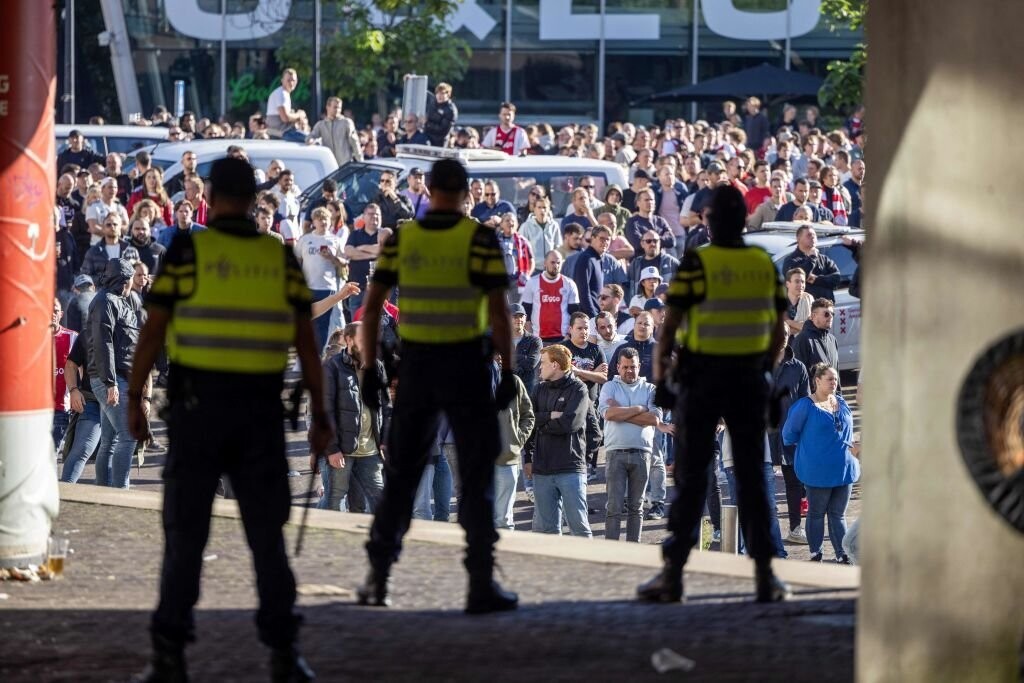 Ajax vs Feyenoord match abandoned due to fan flares  