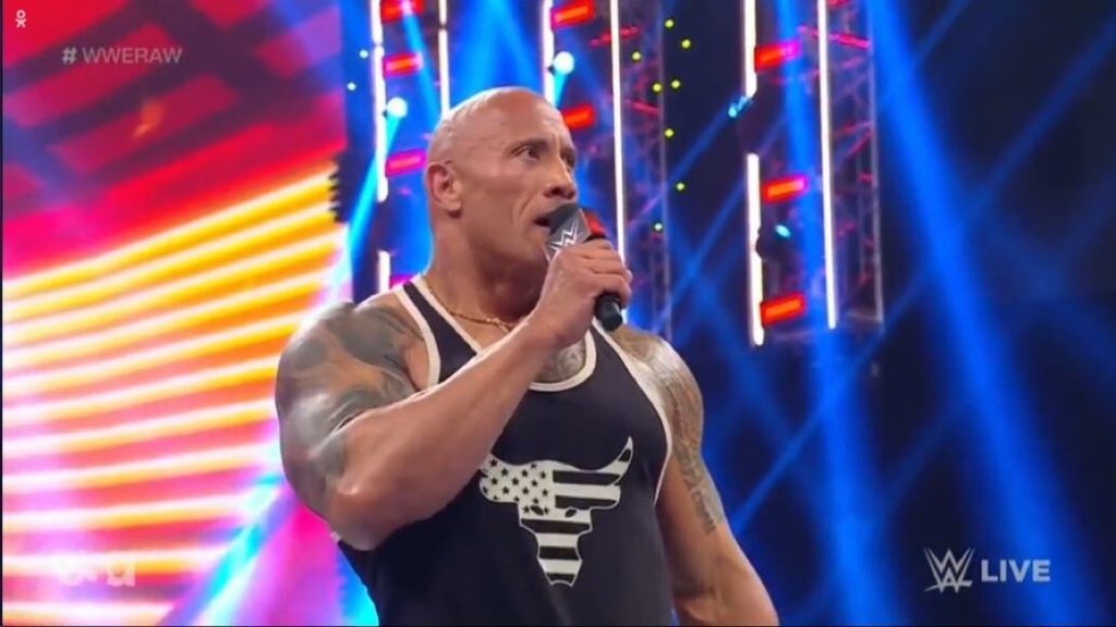 The Rock Returns To WWE, Teases Match With Roman Reigns  