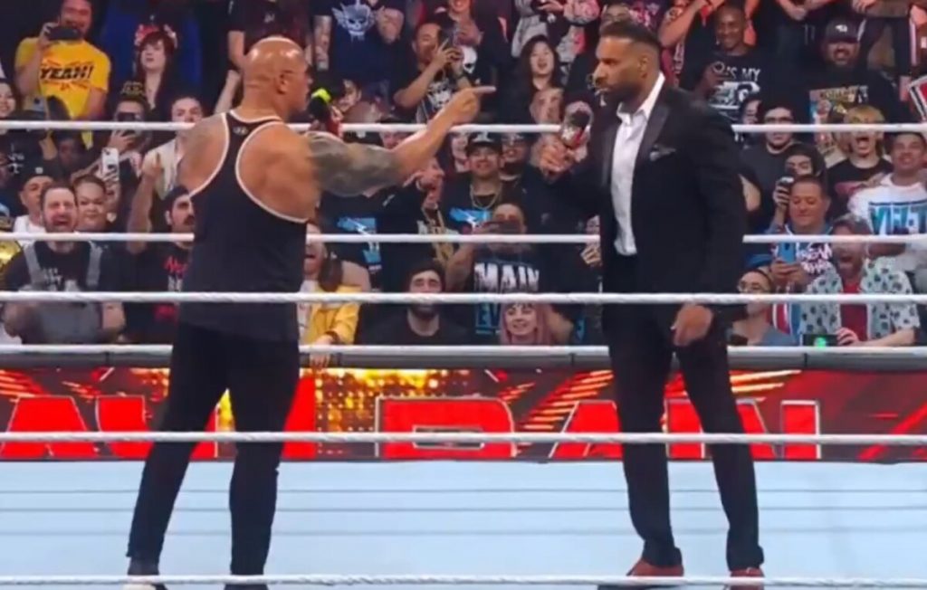 The Rock Returns To WWE, Teases Match With Roman Reigns  