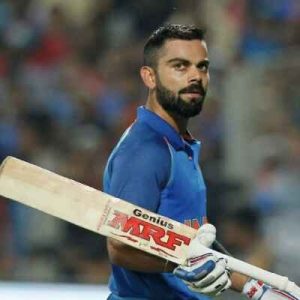 Cricketer Virat Kohli signs a young fan's RCB jersey!  