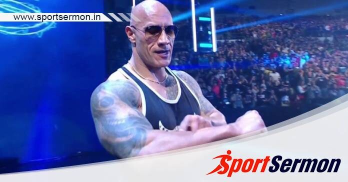 The Rock Returns To WWE, Teases Match With Roman Reigns  