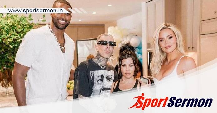 Tristan Thompson poses with Kourtney & Khloe Kardashian  