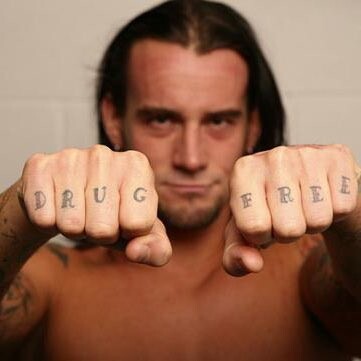 Meaning behind CM Punk's tattoos and their significance  