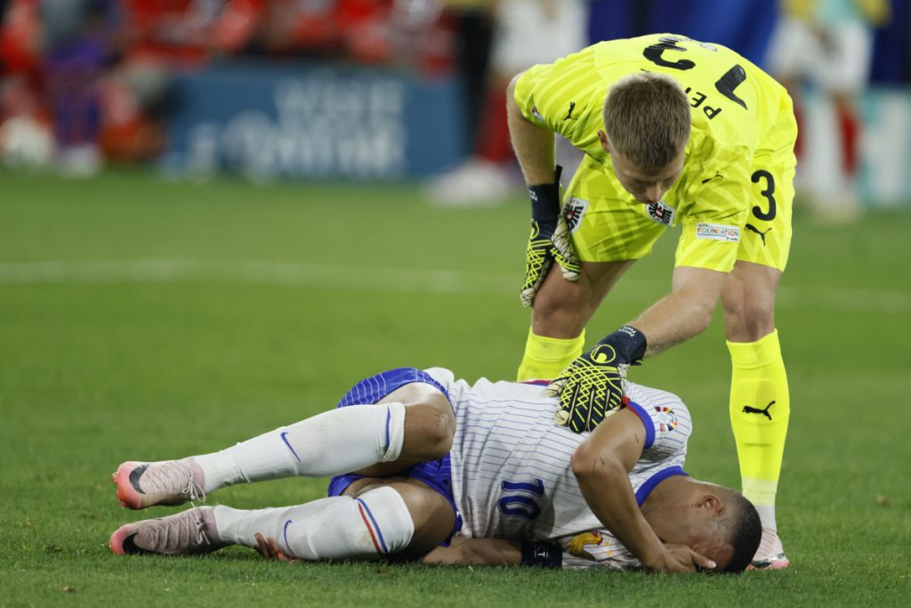 Kylian Mbappe responds after breaking his nose fears of early Euro 2024 exit  