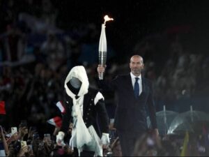 Who was the Mask Torchbearer at Olympics Opening Ceremony?  