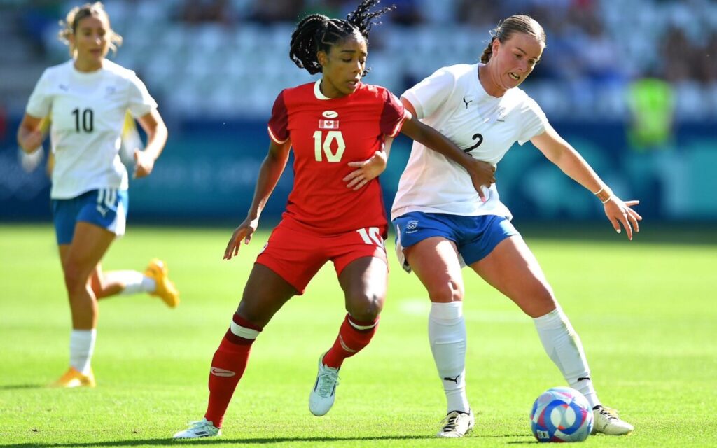 Paris Olympics 2024: कनाडा की फुटबॉल टीम ड्रोन कांड में फंसी, 6 अंकों का नुकसान Paris Olympics 2024: कनाडा की फुटबॉल टीम ड्रोन कांड में फंसी, 6 अंकों का नुकसान