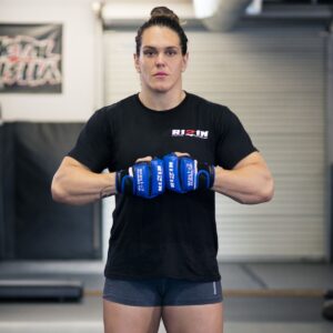 Craig Jones forcefully kisses Gabi Garcia at the intergender pre-fight faceoff  