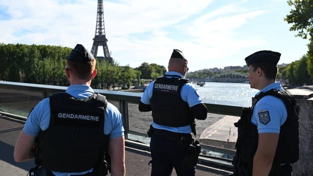 Unidentified Man Tries Climbing Eiffel Tower During Olympics Closing Ceremony  