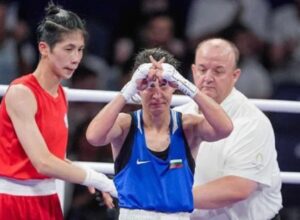 Boxer Svetlana Staneva makes the X symbol after losing to 'biological male'  