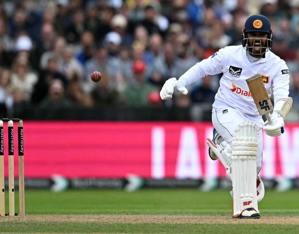 Dhananjaya hits fighting fifty but England chip away  