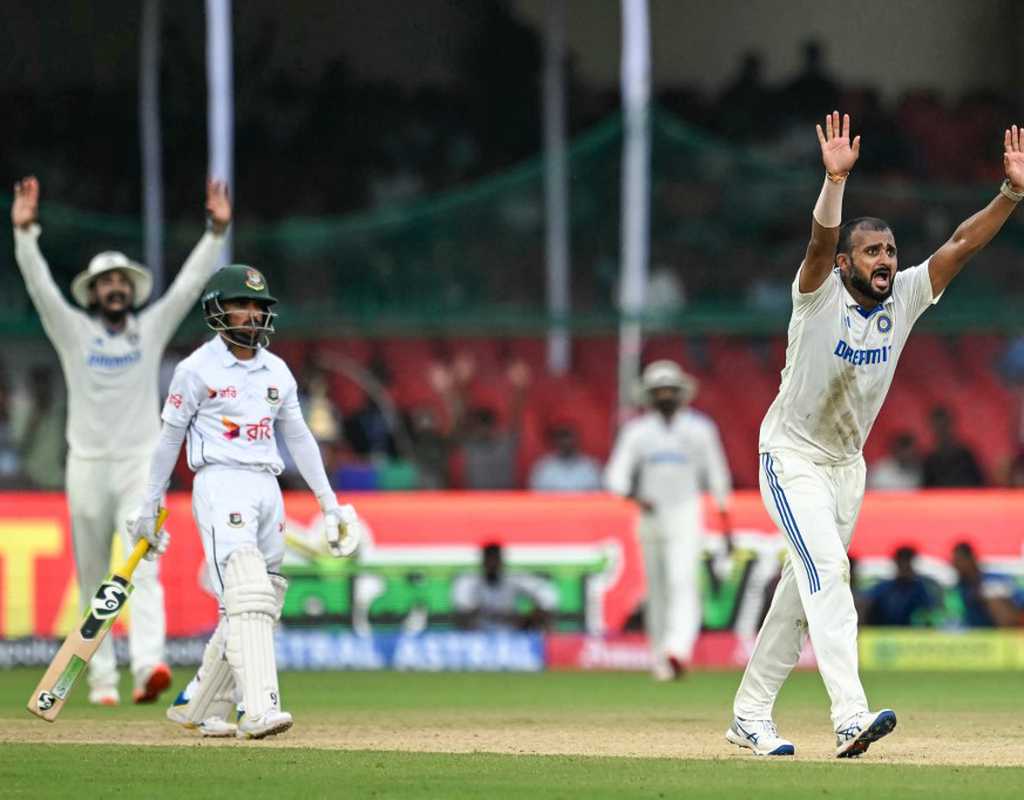 Bangladesh stay afloat on rain-marred opening day  