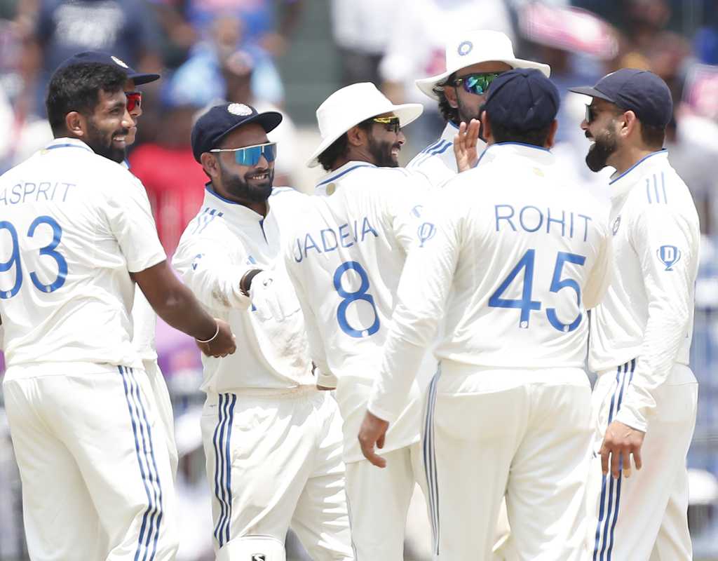 Bowlers strengthen India's grip with frequent strikes  