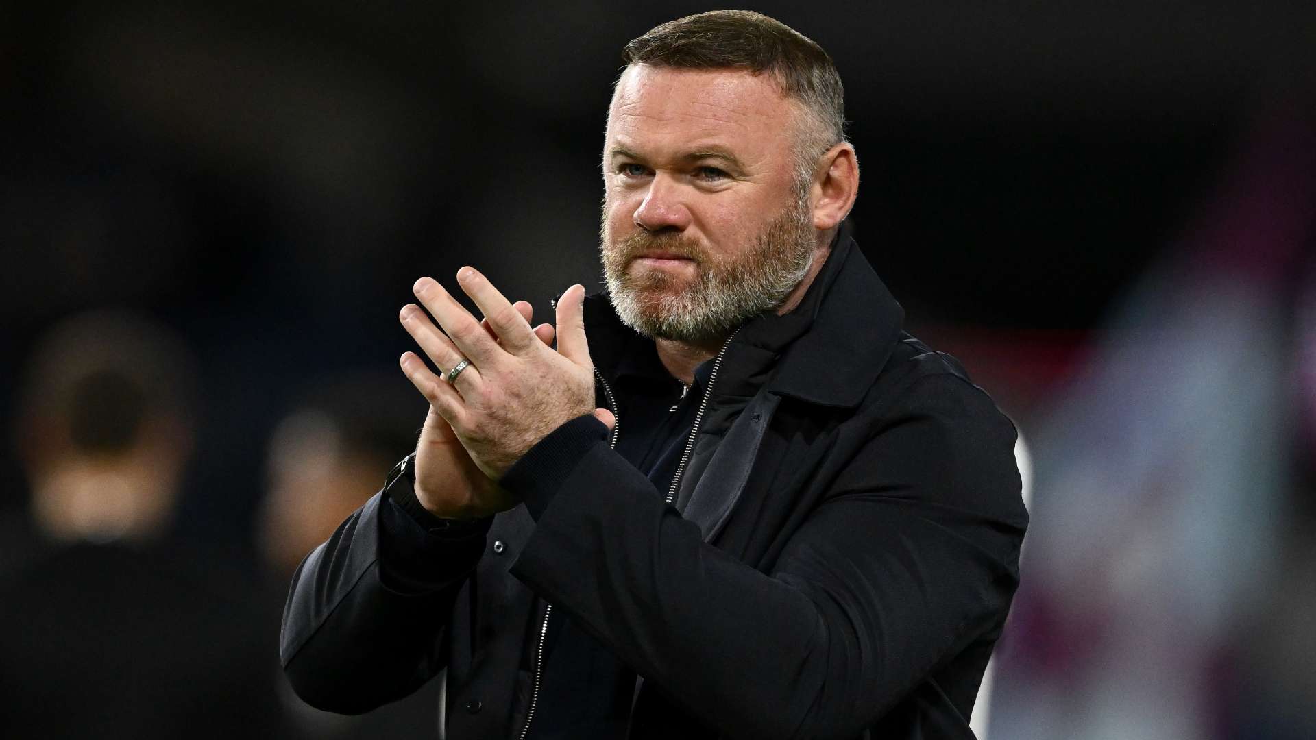 Rooney insists he's 'very calm' as a manager despite hot-head rep  