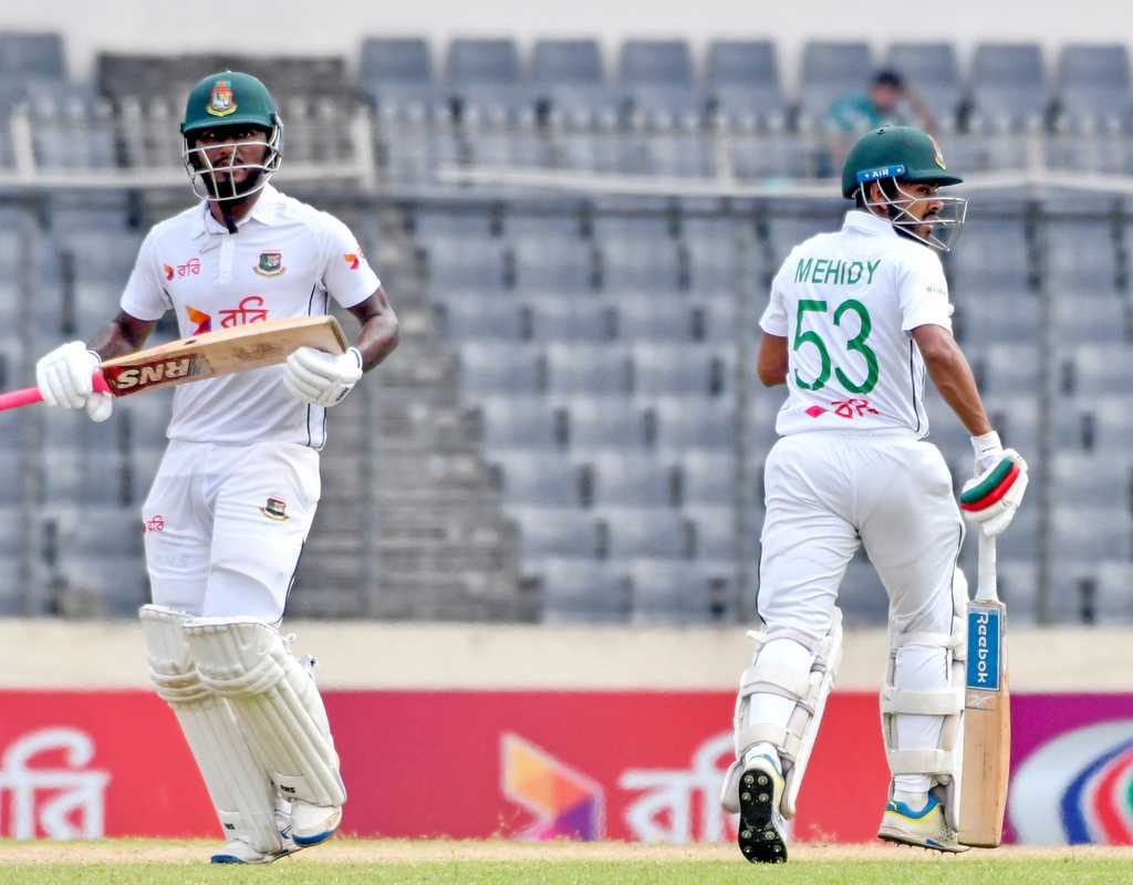 Mehidy, Jaker keep Bangladesh afloat on rain-hit day  