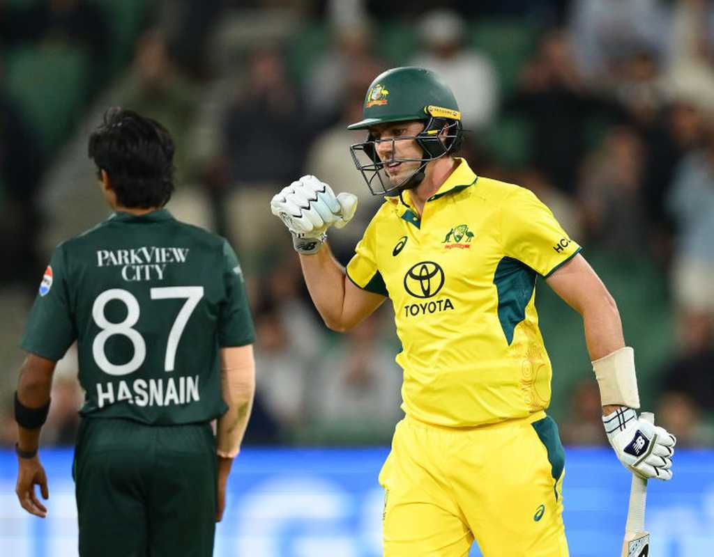 Cummins sees off fiery Rauf to seal tight win  