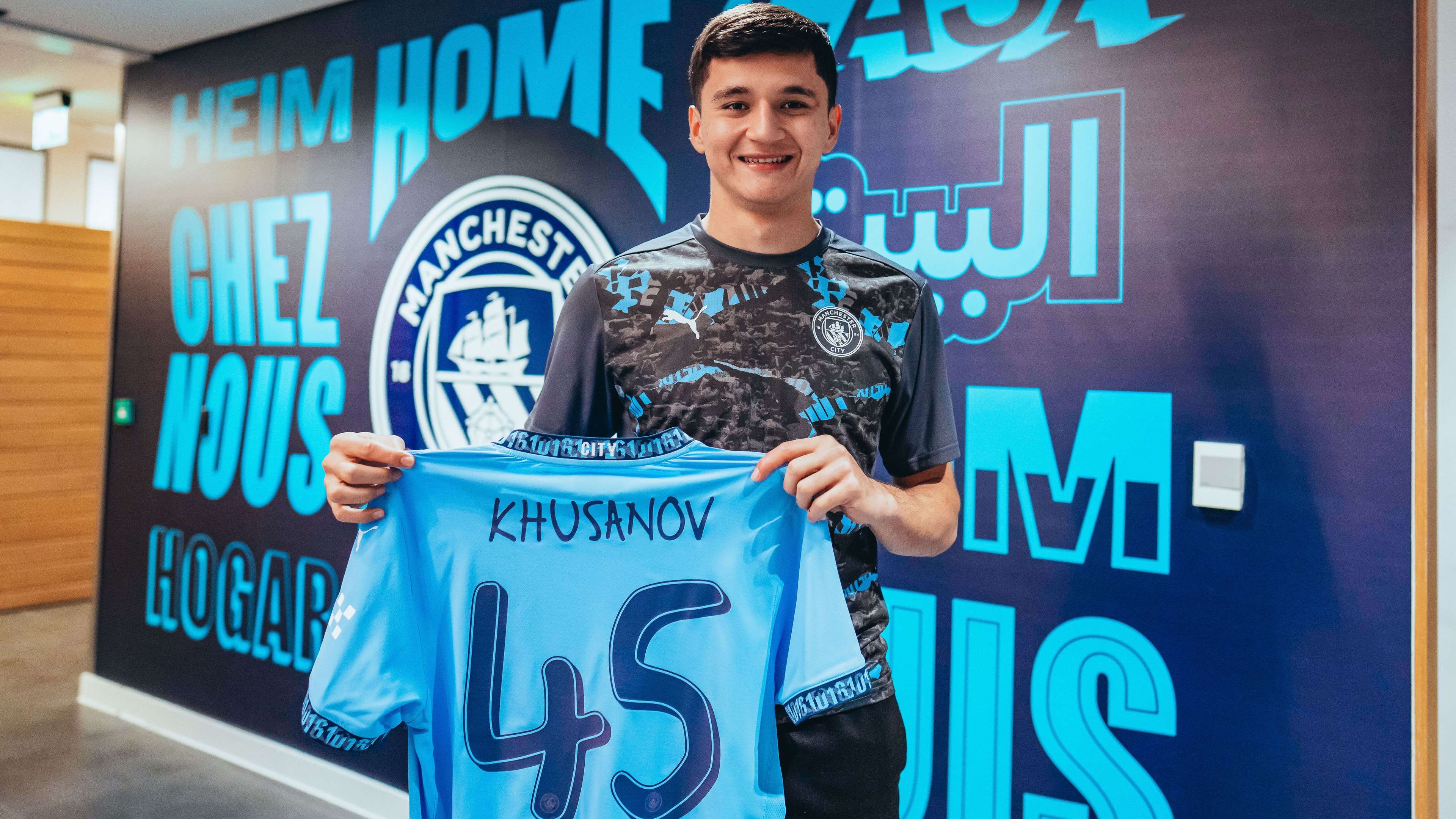 Man City sign 'really exciting' Khusanov in £34m transfer  