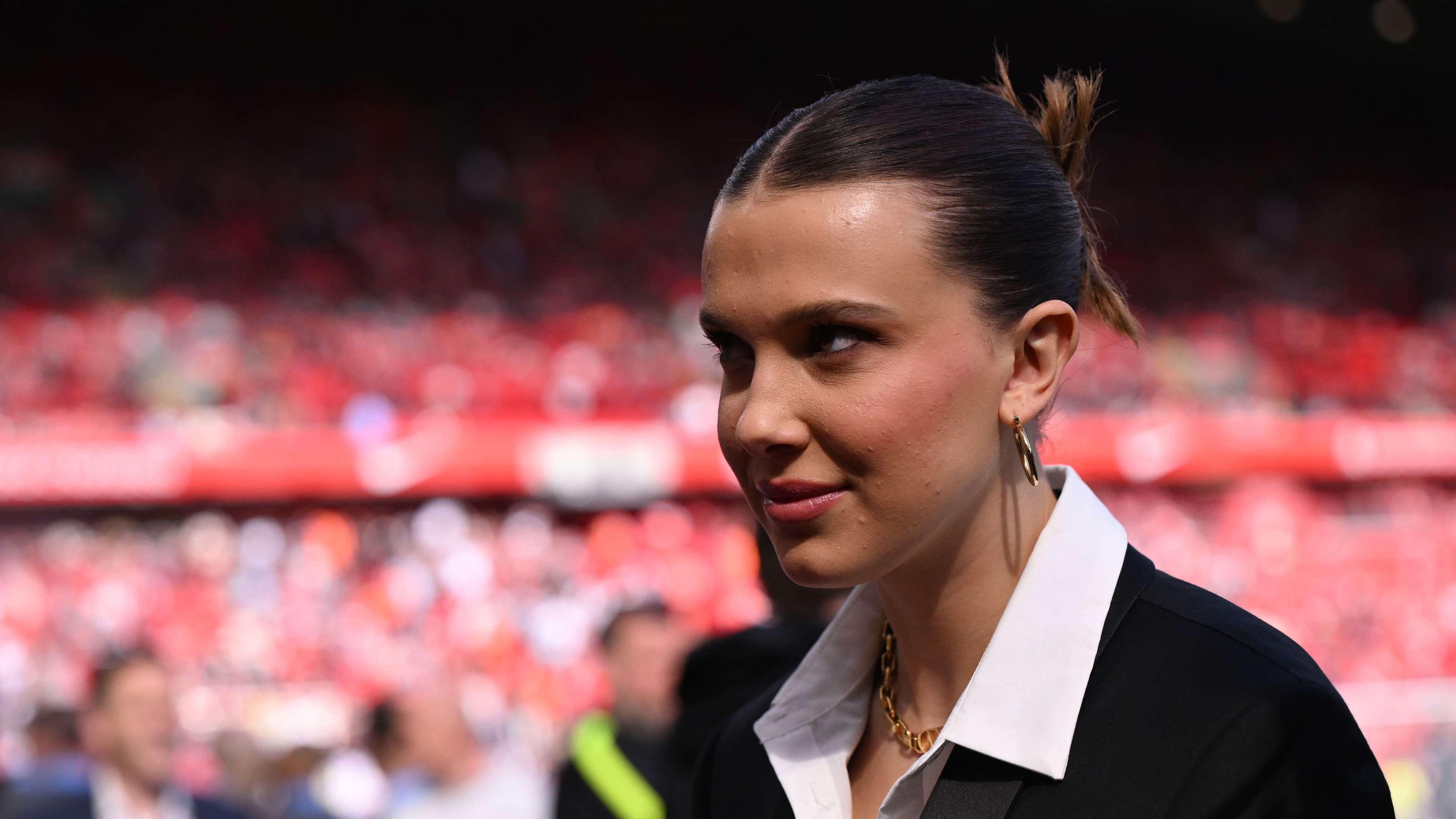 Millie Bobby Brown attends Liverpool's potential title winner  