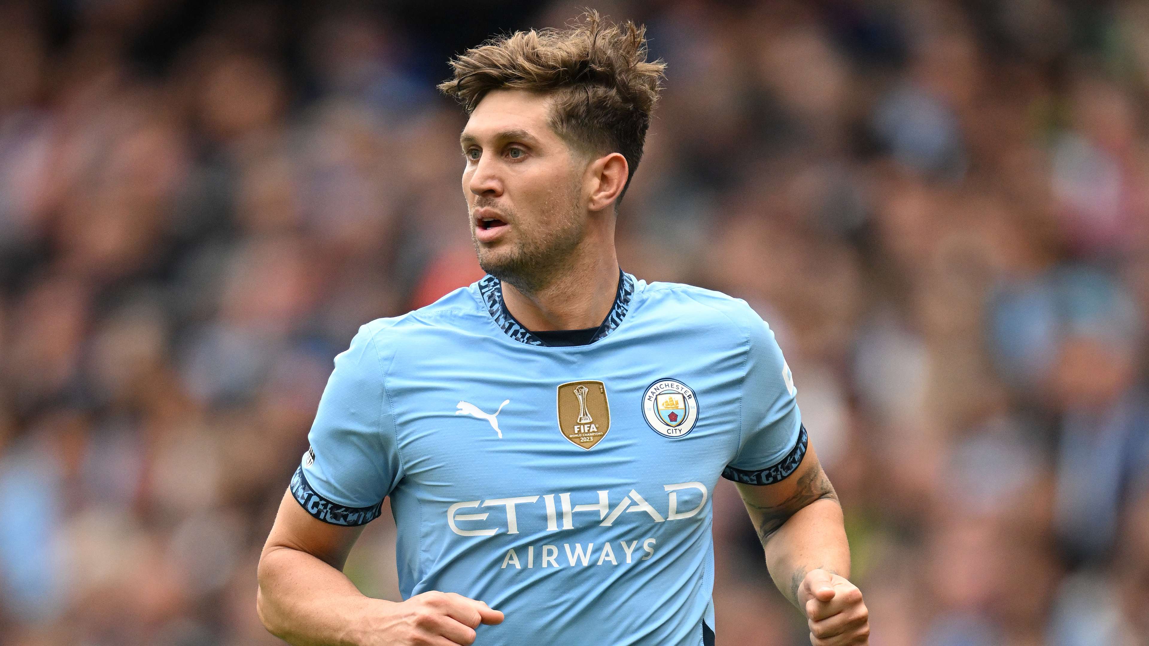 How much does John Stones earn at Man City?  