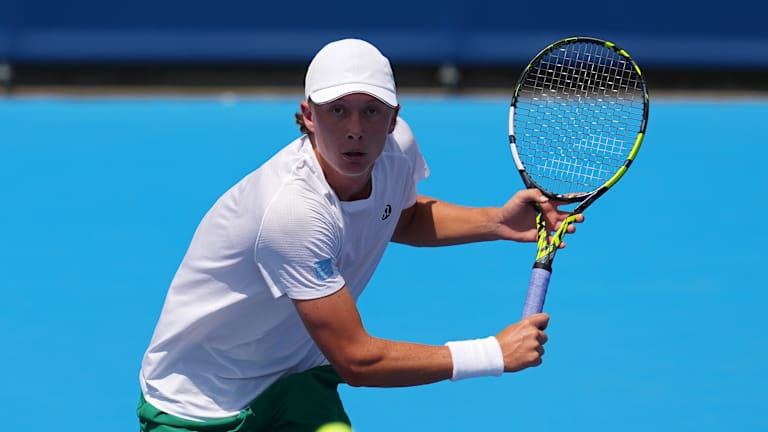 How did Zheng Qinwen spend her time on the sidelines after elbow surgery?  