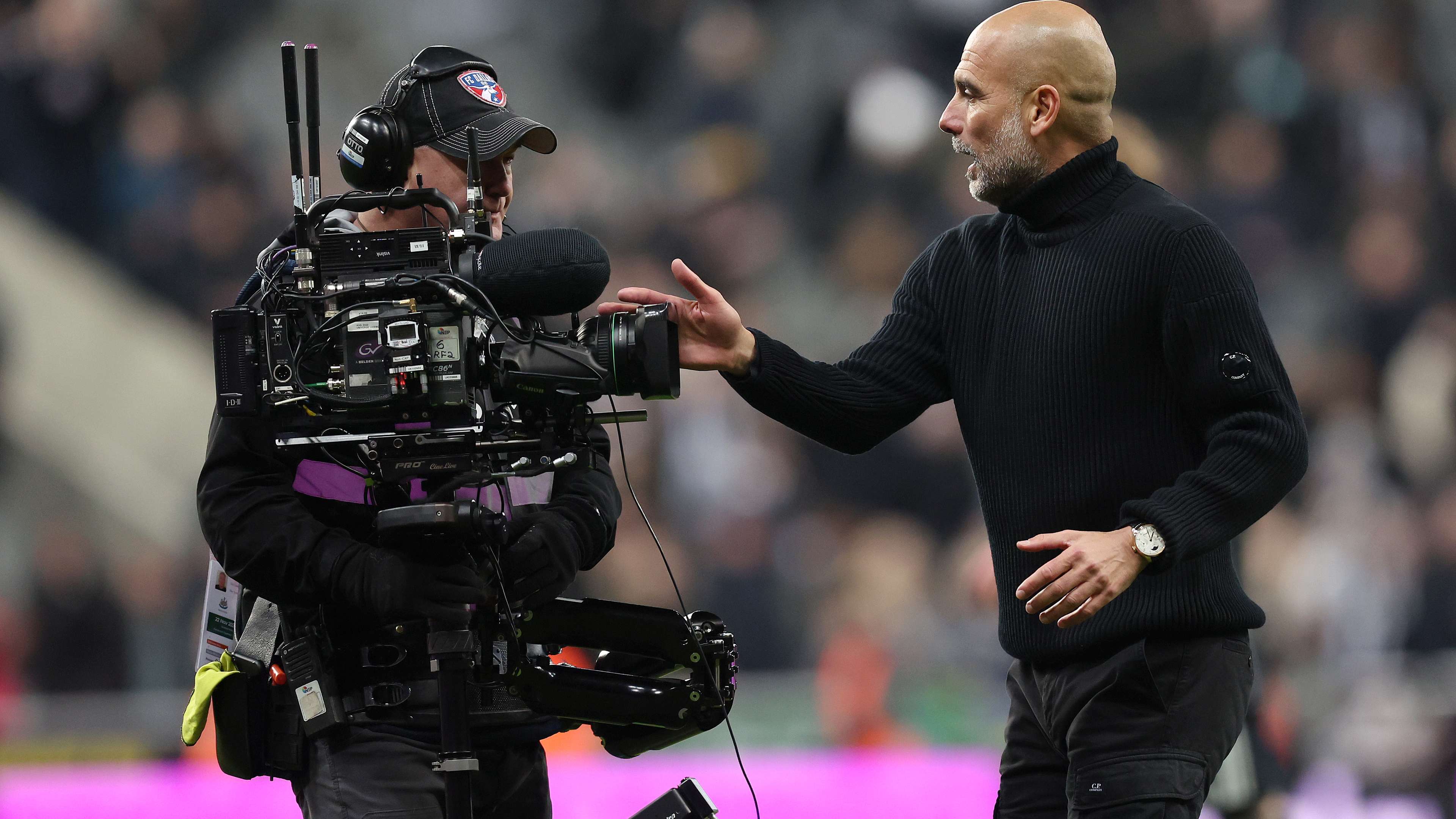 'Embarrassed' Pep apologises for bizarre cameraman clash  