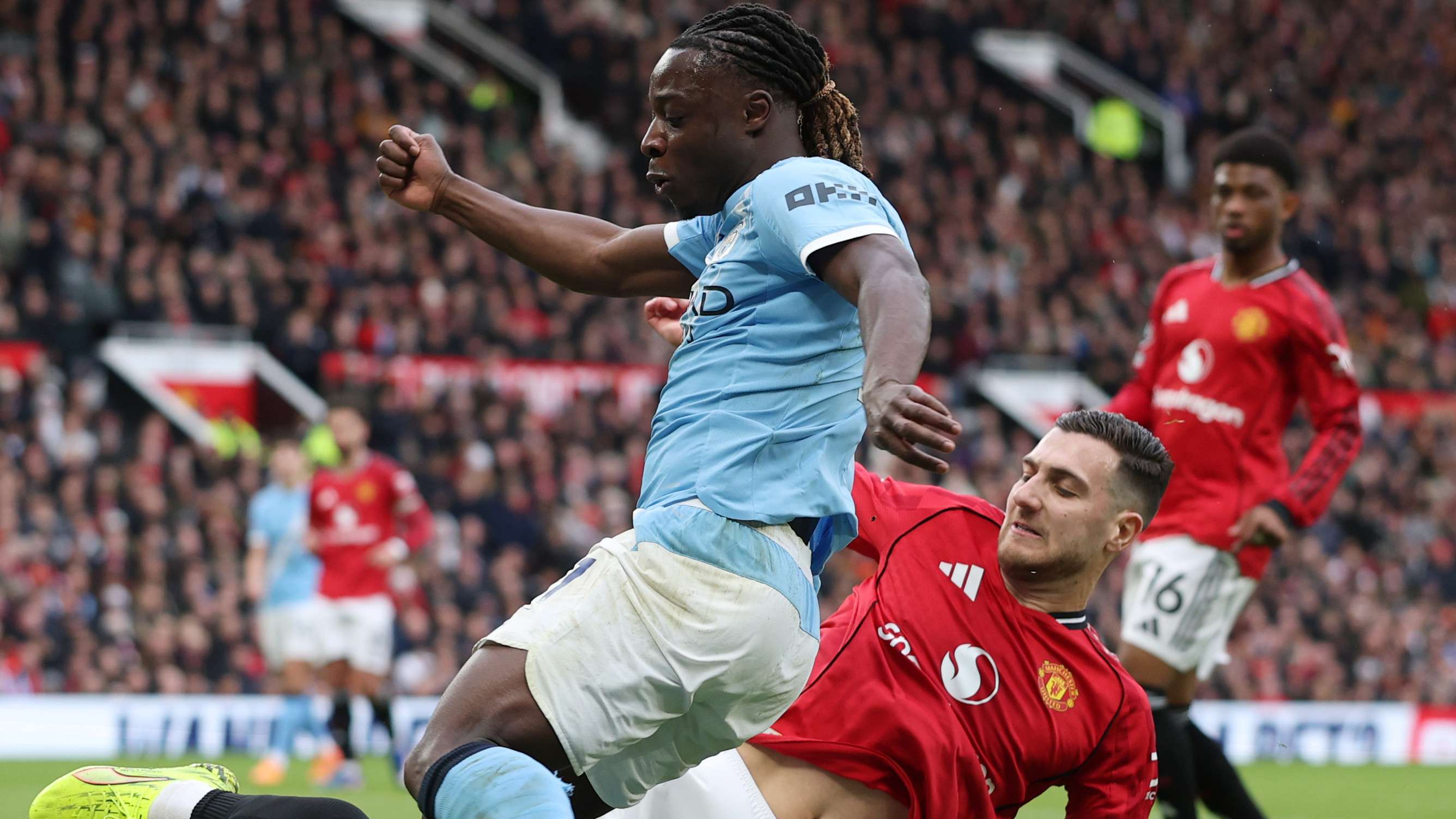 How Dalot escaped Manchester derby red for brutal foul on Doku  