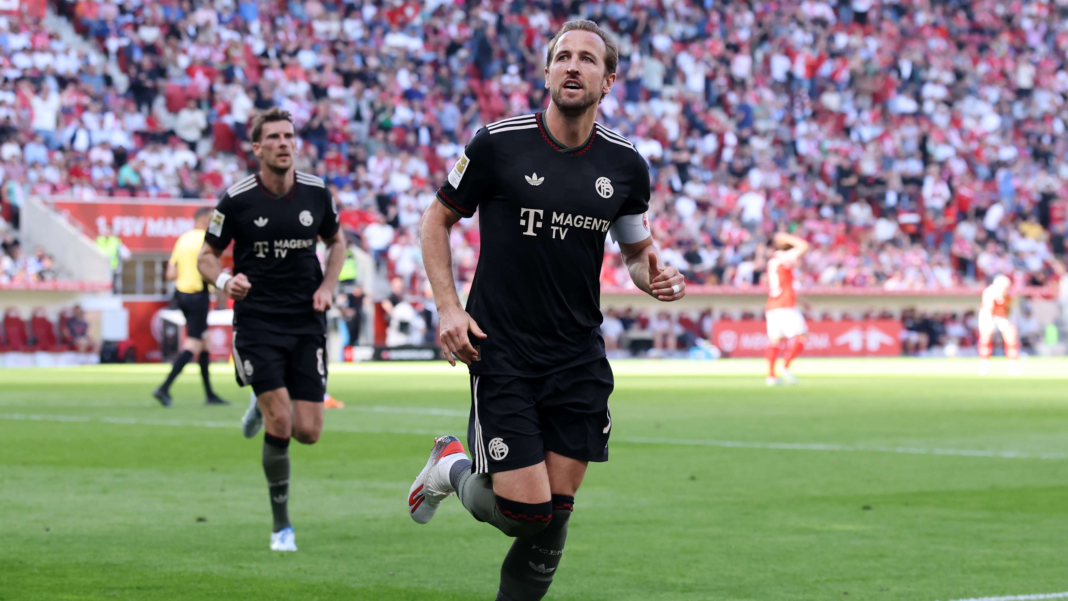 Kane hits 53rd goal as Bayern complete Mainz 'miracle'  