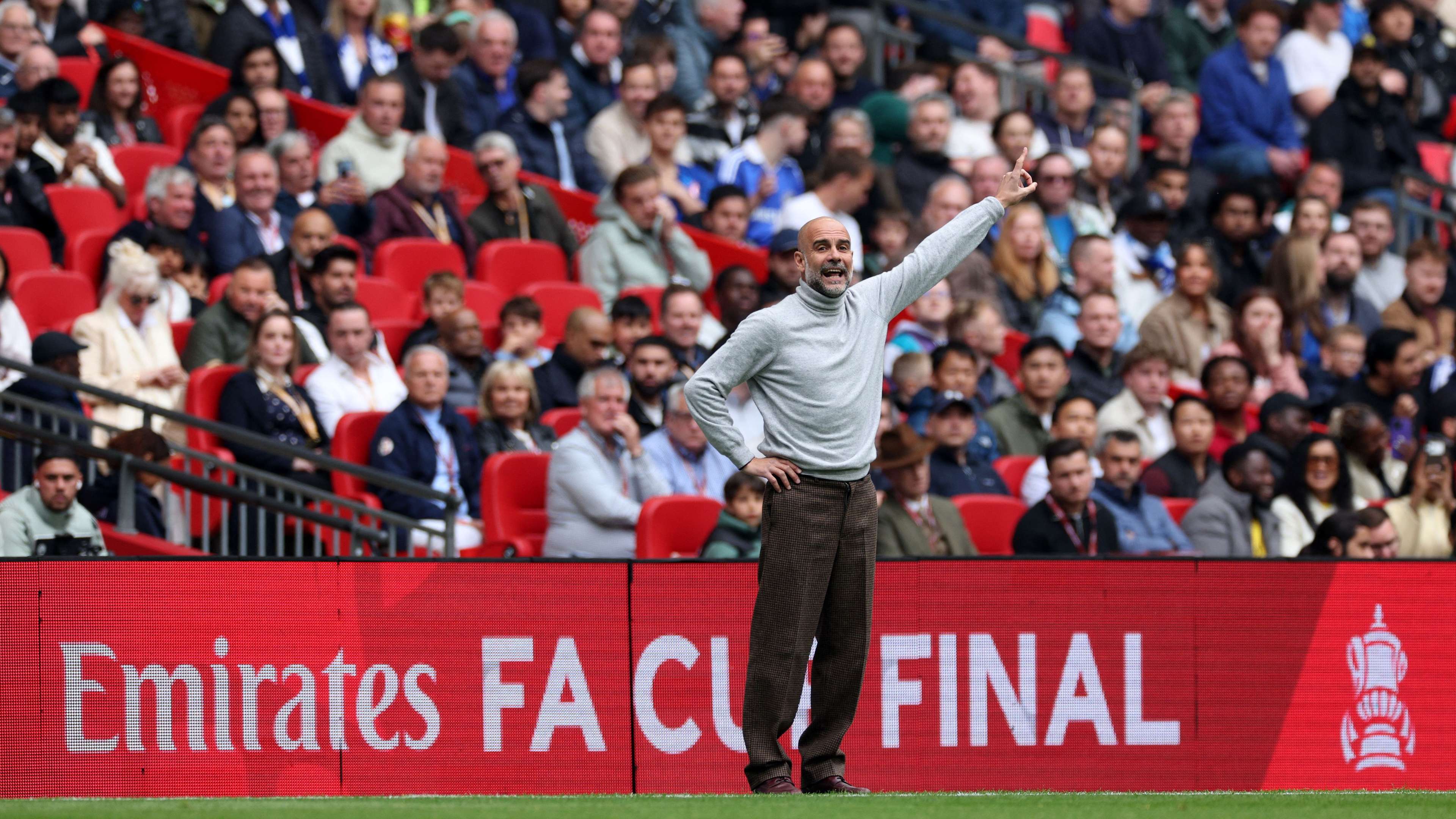 Guardiola makes history as Man City secure double  