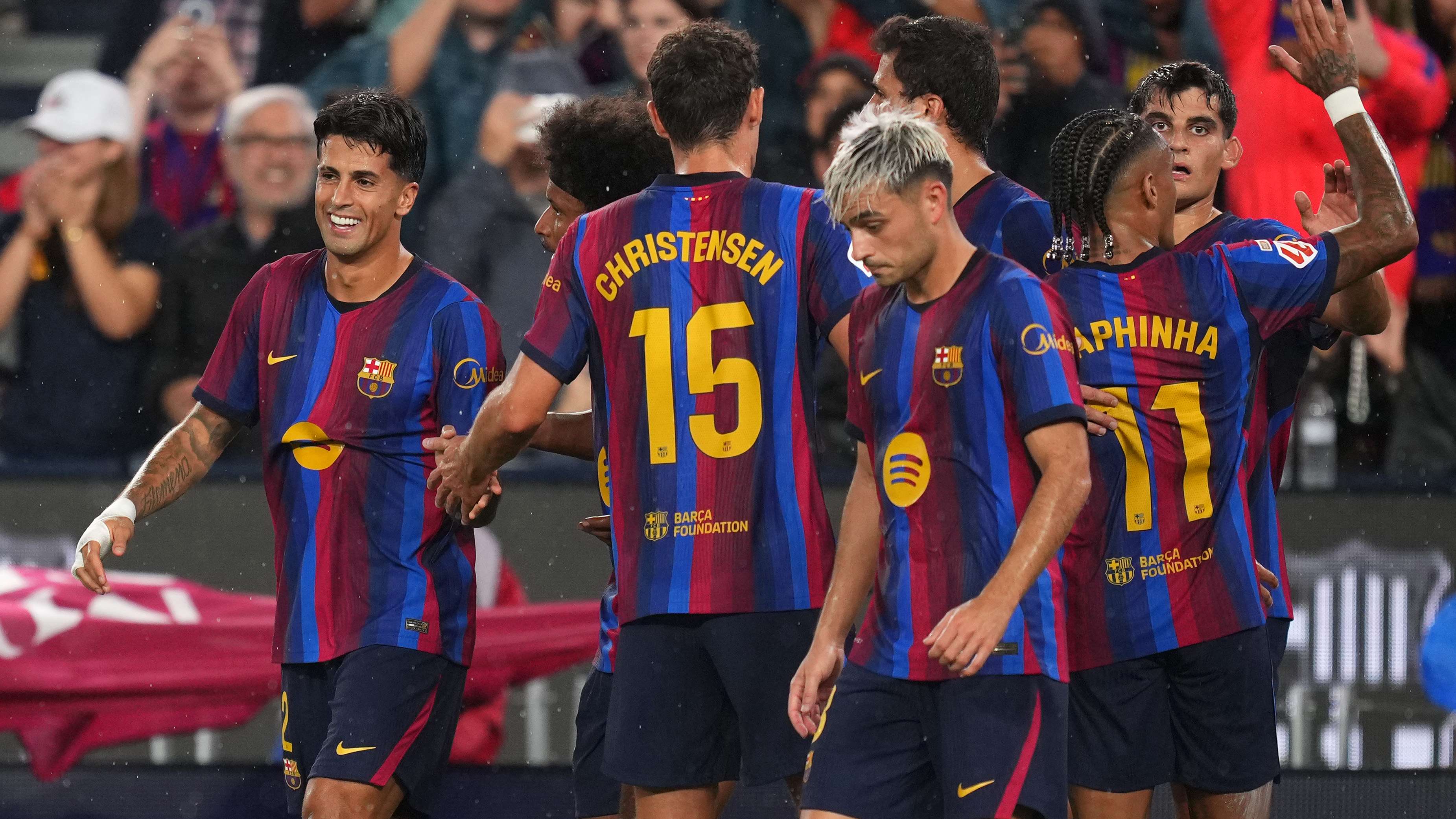 Why was the Levante v Bilbao match cancelled while Barcelona's clash with Racing was played despite the rain warning?  